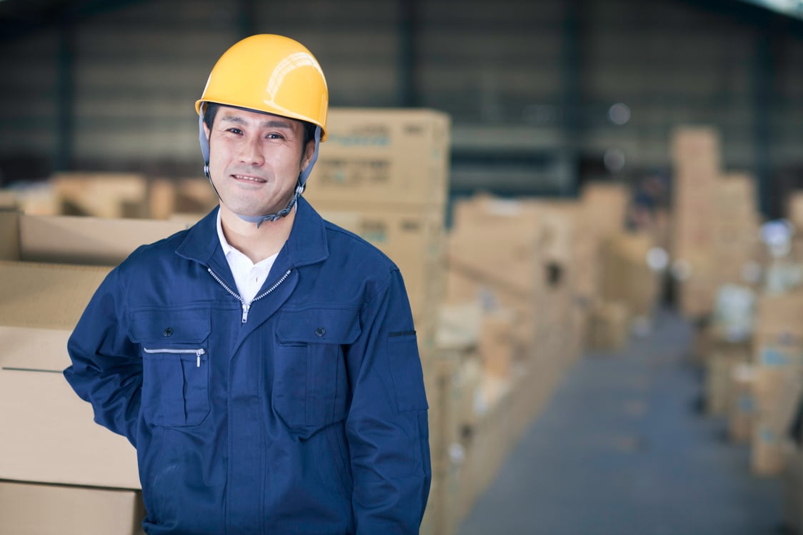 Japanese Worker in Warehouse