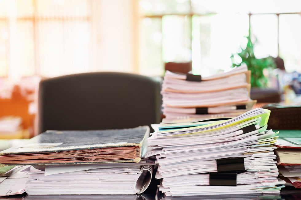 Piles of Documents on Office Table